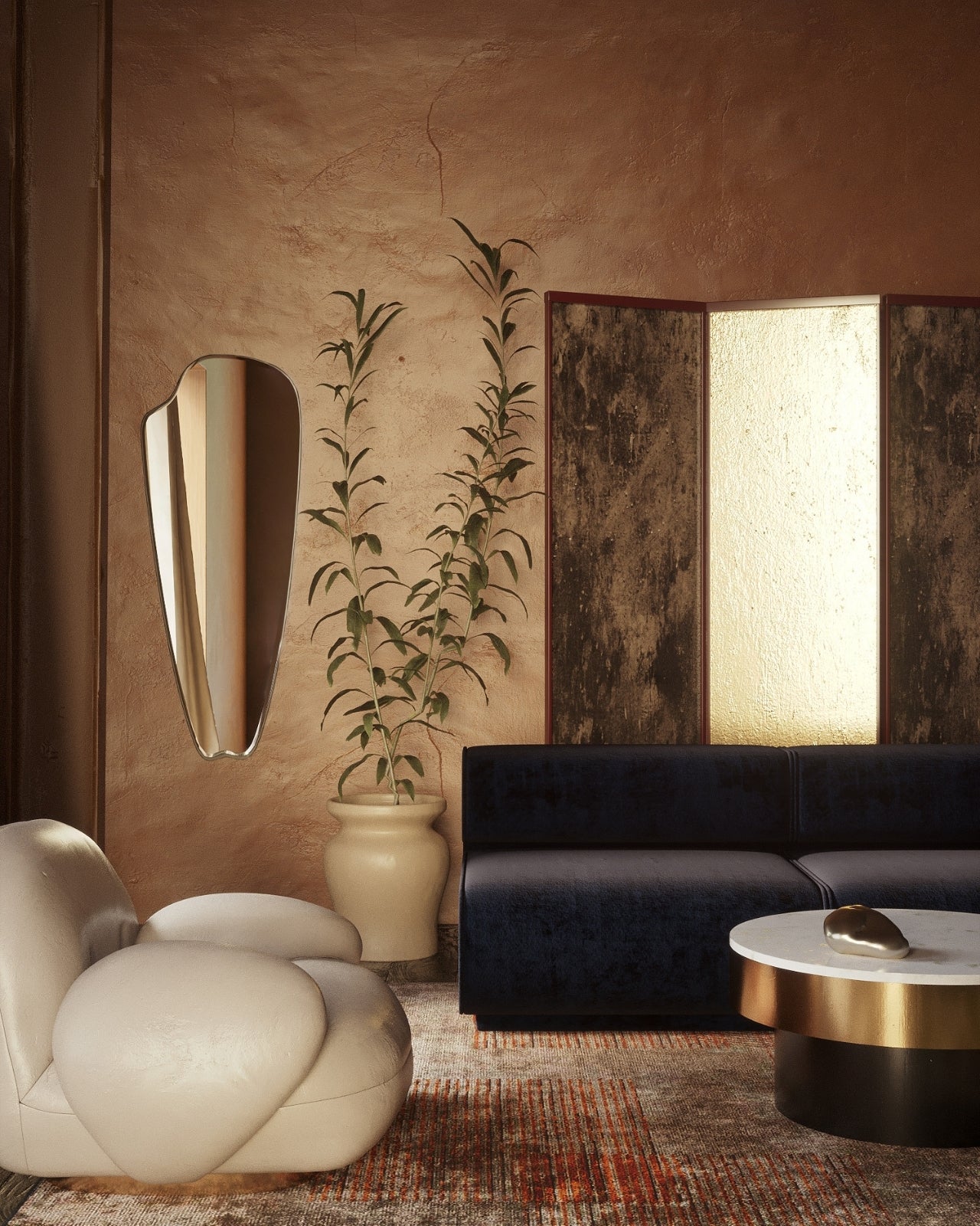 Horizontally mounted frameless wall mirror with an elongated organic shape, displayed above a light-colored sofa in a minimalist interior.