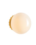 Round wall sconce with white glass shade and brass wall mount, shown against a white background.