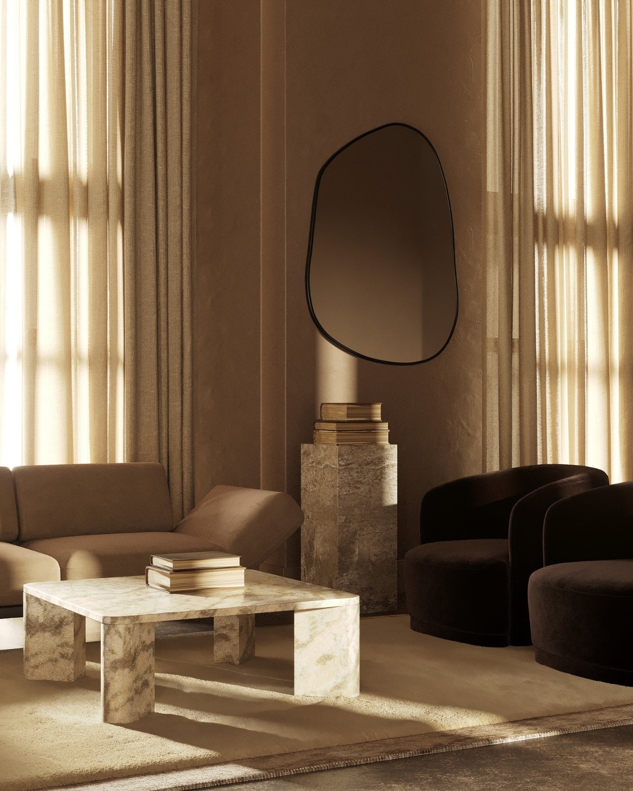 Asymmetrical wall mirror mounted in a warm, neutral-toned living room with stone furniture, soft seating, and filtered natural light.