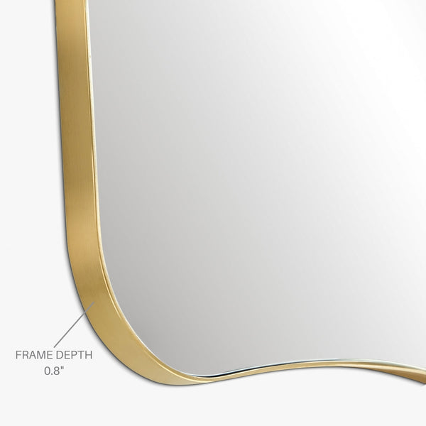 Asymmetrical mirror close-up showing a thin brass-colored metal frame with a labeled 0.8-inch frame depth on a white background.