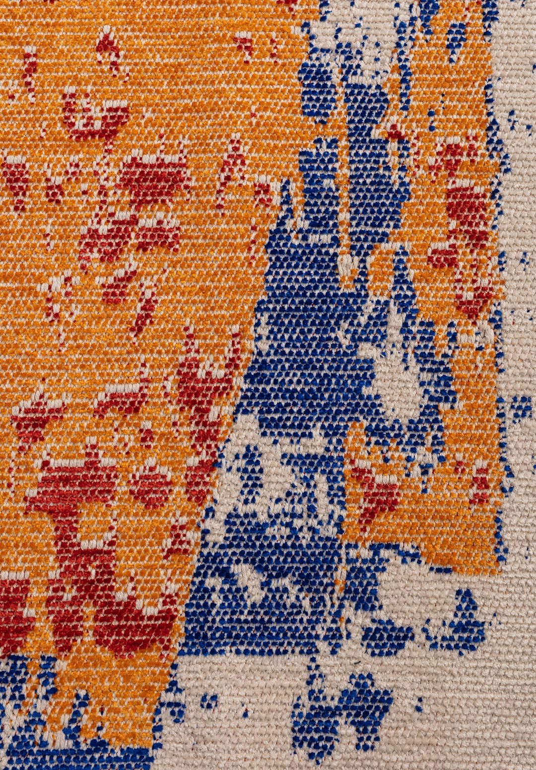 Abstract multicolor flat-woven rug detail.
