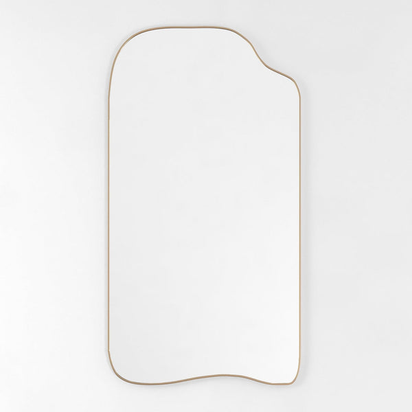 Asymmetrical full-length mirror with an organic shape and thin brass-colored frame on a white background.